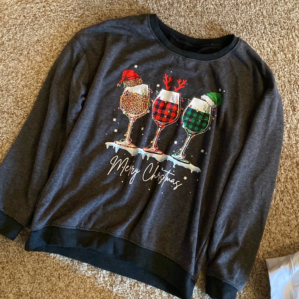 Merry Christmas wine glass sweatshirt.